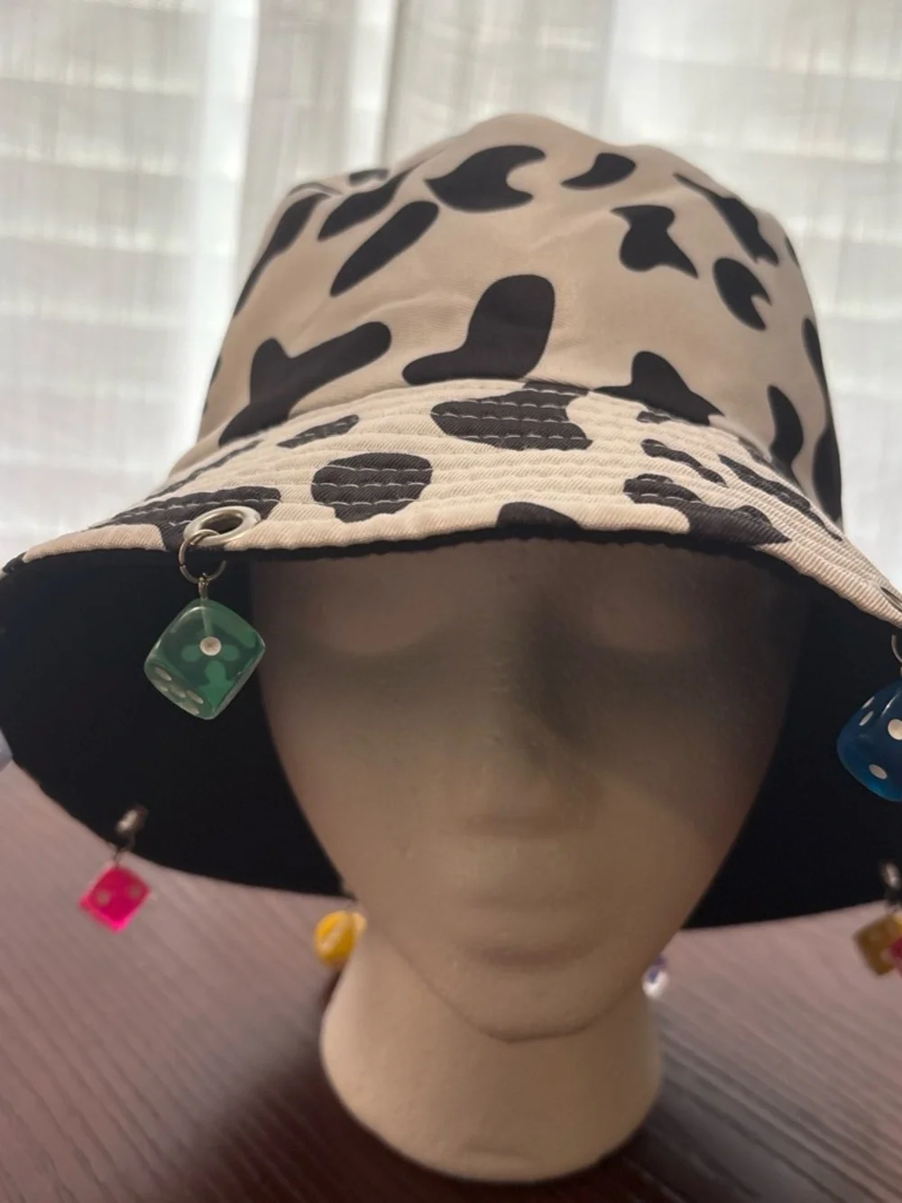 Black & White Cow Print Bucket Hat with Colorful Dice Charms